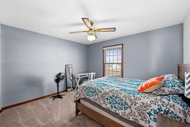 bedroom with baseboards, a ceiling fan, and carpet flooring