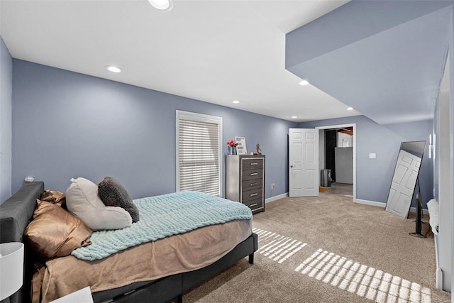 bedroom with recessed lighting, baseboards, and light carpet