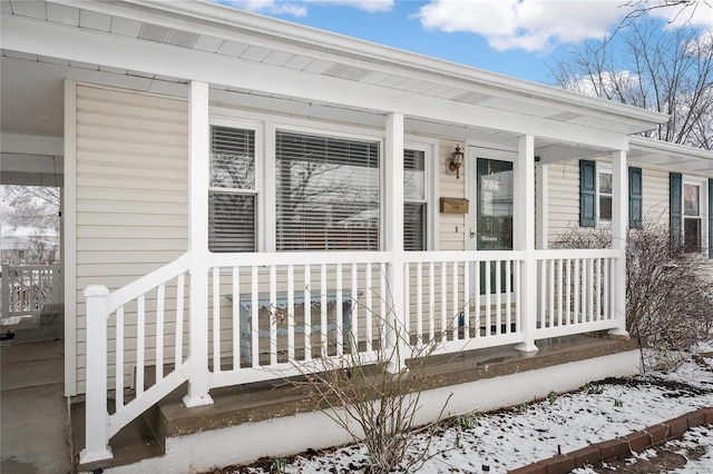 doorway to property with covered porch