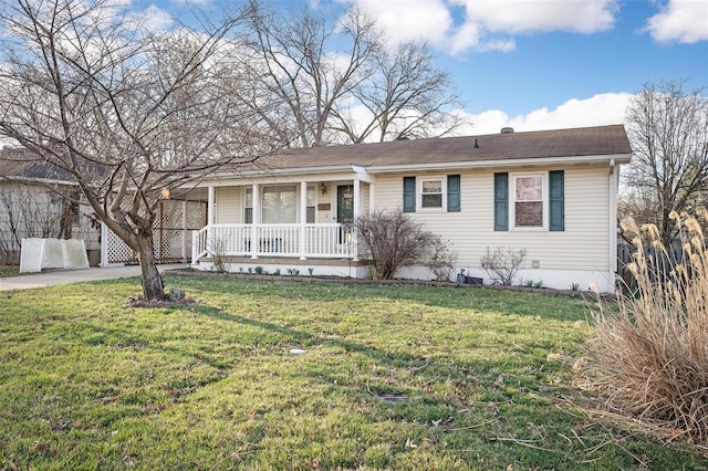 ranch-style house with a front lawn and covered porch