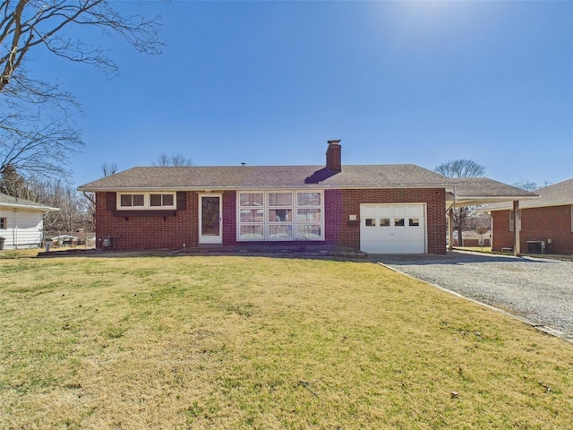 ranch-style home with brick siding, a chimney, a garage, driveway, and a front lawn