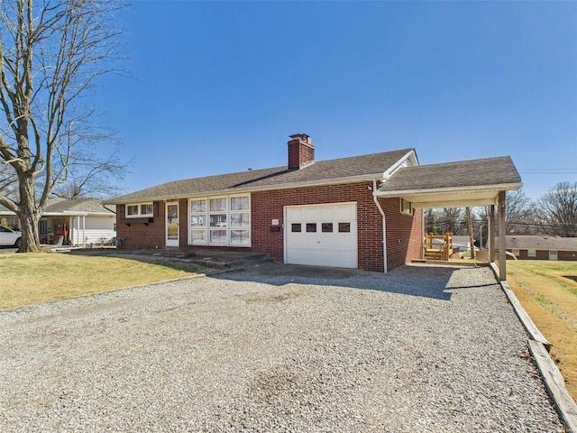 ranch-style home with a garage, brick siding, driveway, a front lawn, and a chimney