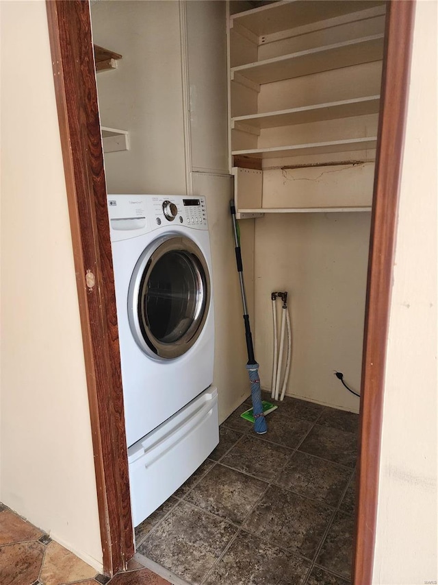 washroom featuring washer / clothes dryer