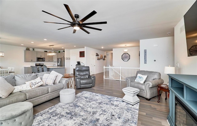 living room featuring recessed lighting and light wood-style floors