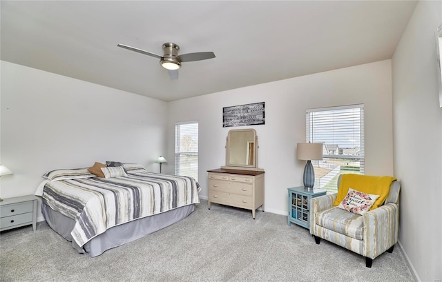 bedroom featuring carpet flooring, baseboards, and ceiling fan