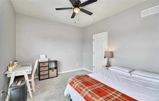 bedroom with a ceiling fan, baseboards, visible vents, and carpet floors