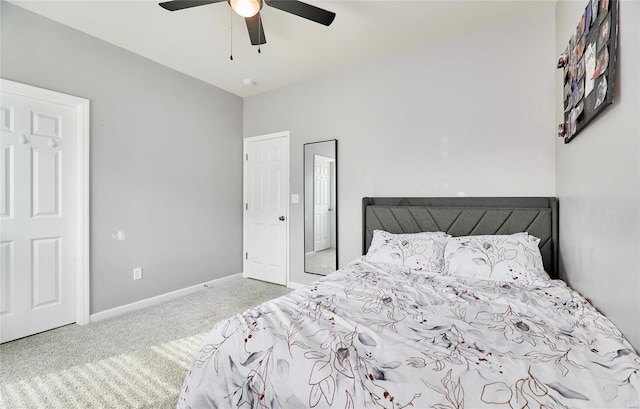 bedroom with baseboards, a ceiling fan, and carpet flooring