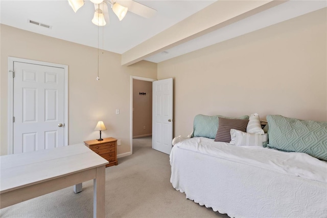 bedroom with visible vents, baseboards, ceiling fan, beamed ceiling, and light colored carpet