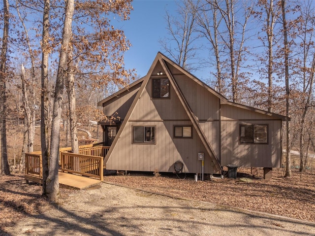 view of side of home featuring a deck