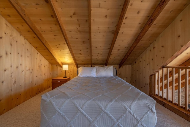 unfurnished bedroom featuring wood ceiling, wood walls, and carpet flooring