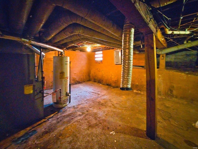 basement featuring electric panel and water heater