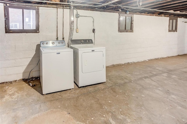 washroom featuring independent washer and dryer and laundry area