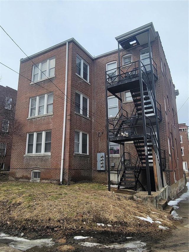 view of building exterior with stairs