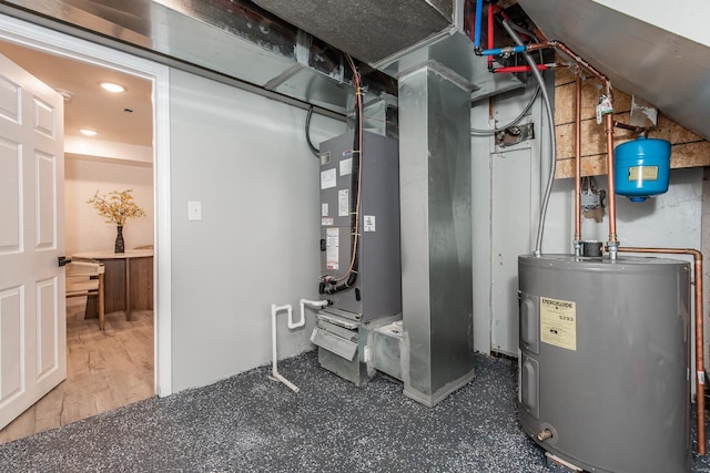 utility room with electric water heater