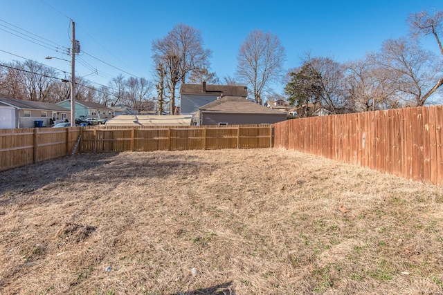 view of yard with fence