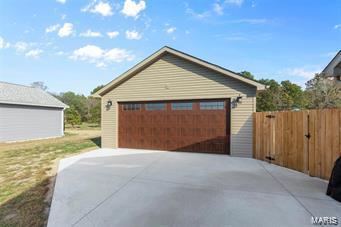 detached garage with fence