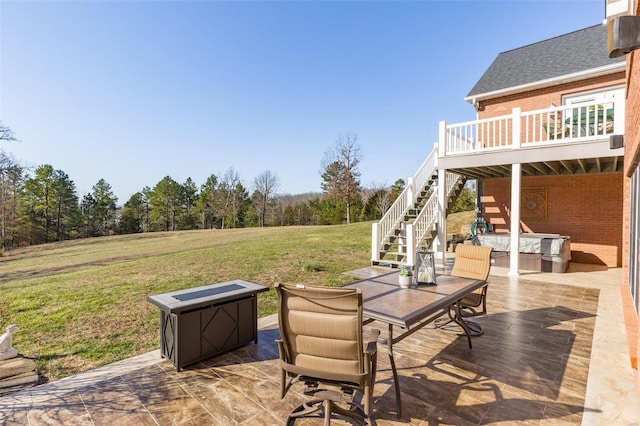 view of patio featuring stairway, an outdoor hangout area, a deck, and outdoor dining space