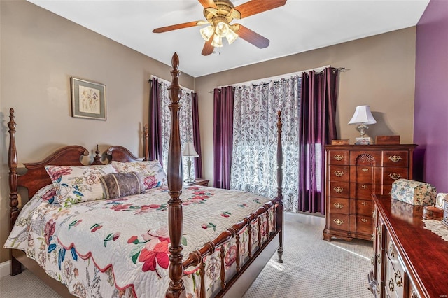 bedroom featuring baseboards, carpet floors, and ceiling fan