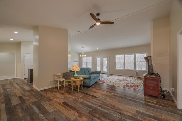 living room featuring dark wood-style floors, baseboards, recessed lighting, french doors, and ceiling fan with notable chandelier