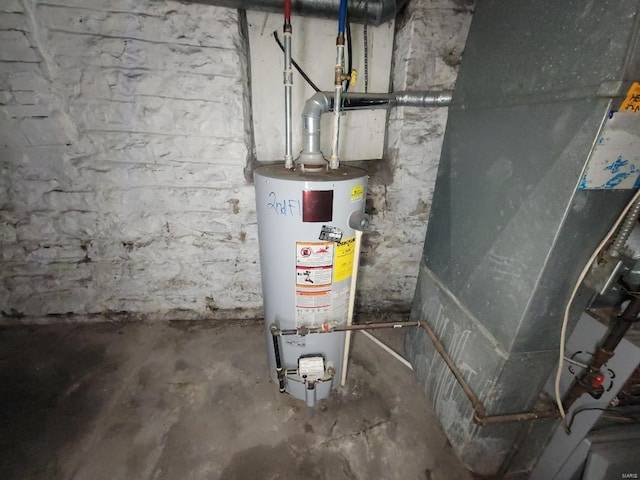 utility room with water heater