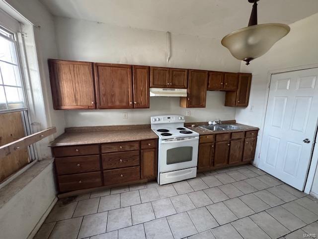 kitchen featuring white electric stove, light tile patterned flooring, a sink, and under cabinet range hood