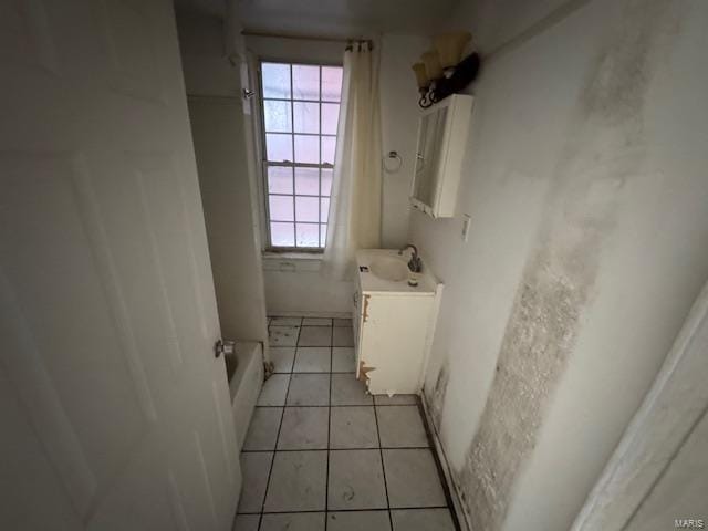 full bath featuring a bathtub, tile patterned flooring, a shower, and vanity