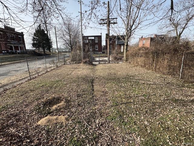 view of yard with fence