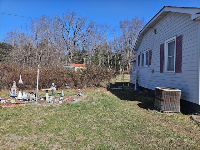 view of yard with central AC