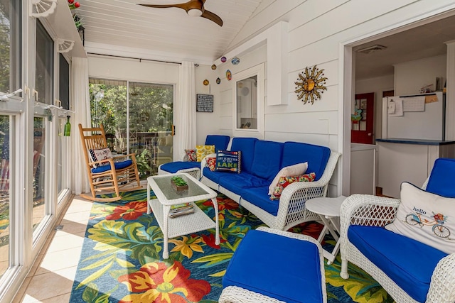 sunroom / solarium with visible vents, wooden ceiling, a ceiling fan, and vaulted ceiling