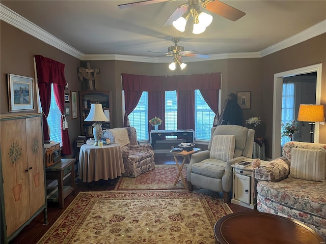 living room featuring ornamental molding and wood finished floors