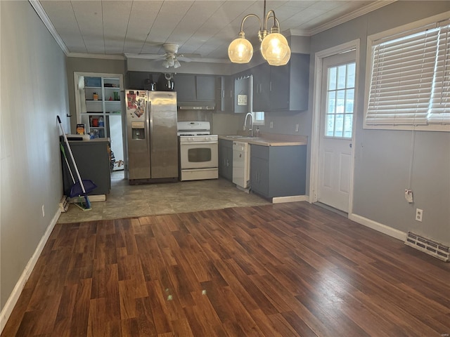 kitchen featuring light countertops, visible vents, gray cabinetry, a sink, and white appliances