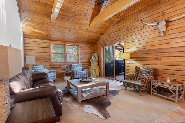 living area featuring wood finished floors, wooden ceiling, vaulted ceiling with beams, and wood walls