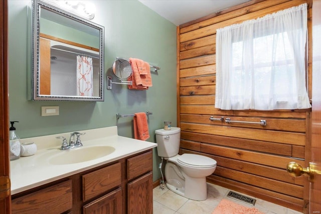 full bath with vanity, visible vents, curtained shower, tile patterned floors, and toilet