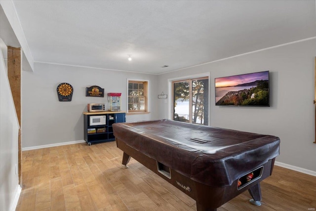 playroom featuring pool table, baseboards, light wood-type flooring, and ornamental molding