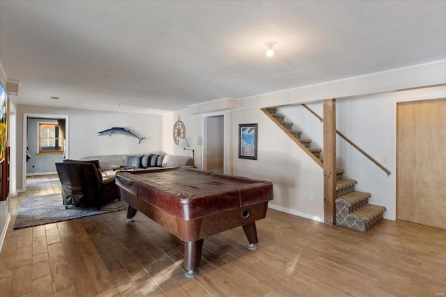 playroom featuring pool table, wood finished floors, and baseboards