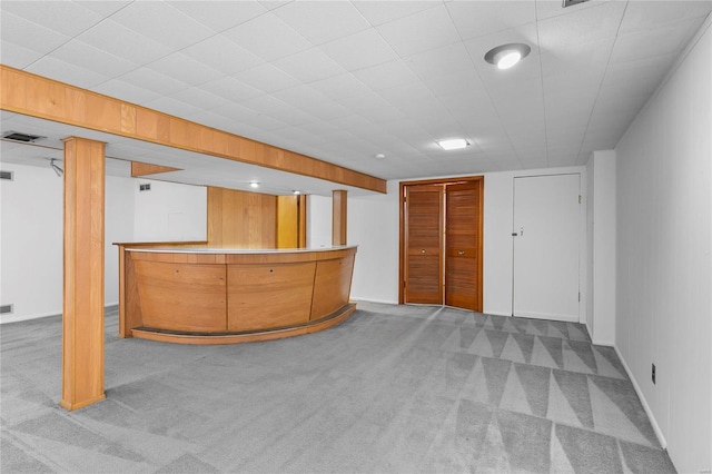 bar featuring a dry bar, carpet, and visible vents