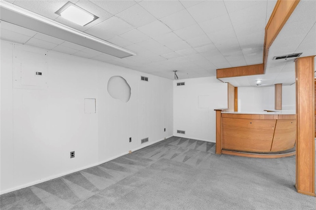 interior space featuring carpet flooring and visible vents