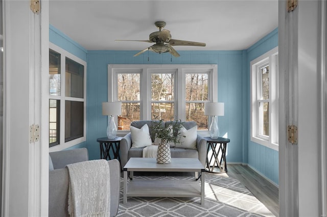 sunroom / solarium with ceiling fan