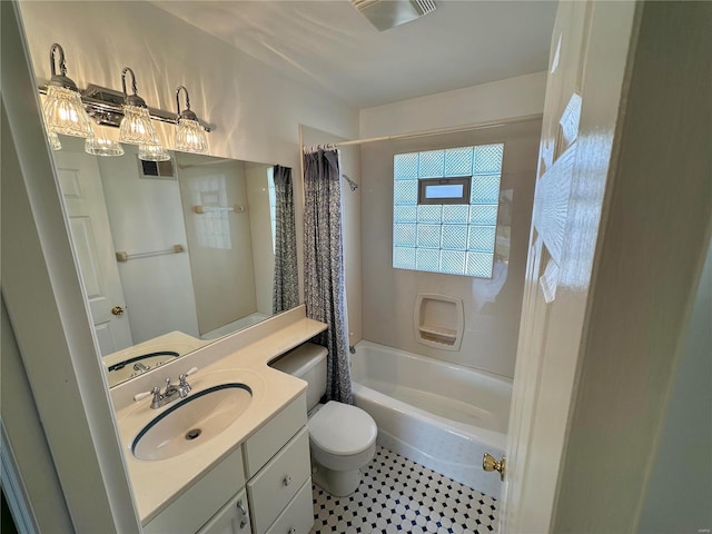 full bath with visible vents, shower / bathtub combination with curtain, toilet, and vanity