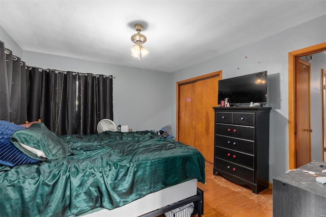 bedroom with wood finished floors