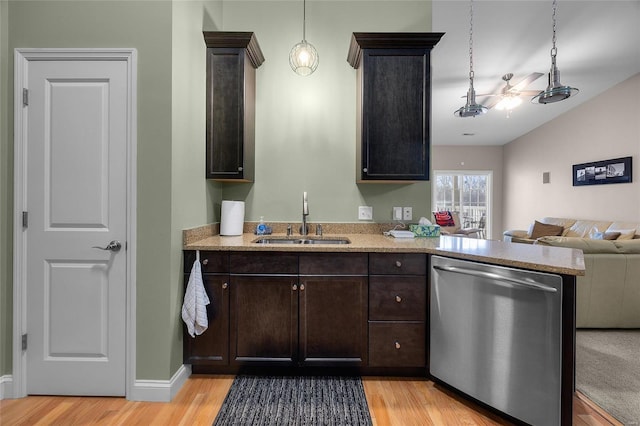 kitchen with dark brown cabinets, ceiling fan, stainless steel dishwasher, light wood-style floors, and a sink