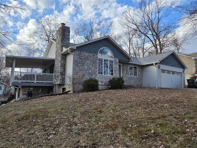 ranch-style home with a garage, stone siding, and a chimney