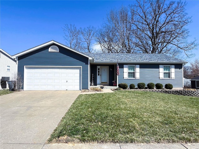 single story home with a garage, concrete driveway, and a front lawn