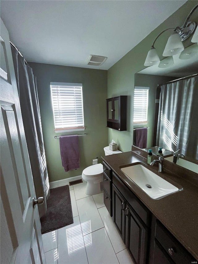 full bath with tile patterned floors, visible vents, toilet, and vanity