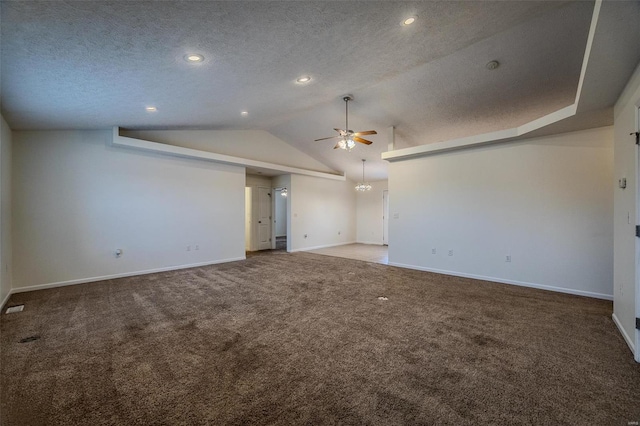 carpeted spare room with recessed lighting, vaulted ceiling, a textured ceiling, ceiling fan, and baseboards