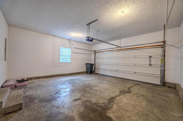 garage with electric panel, baseboards, and a garage door opener