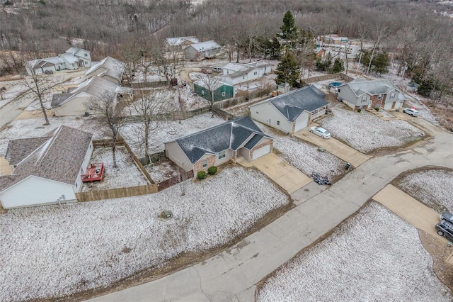 birds eye view of property with a residential view