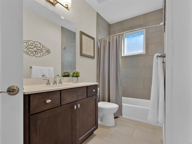 full bath with toilet, tile patterned flooring, shower / bath combination with curtain, and vanity