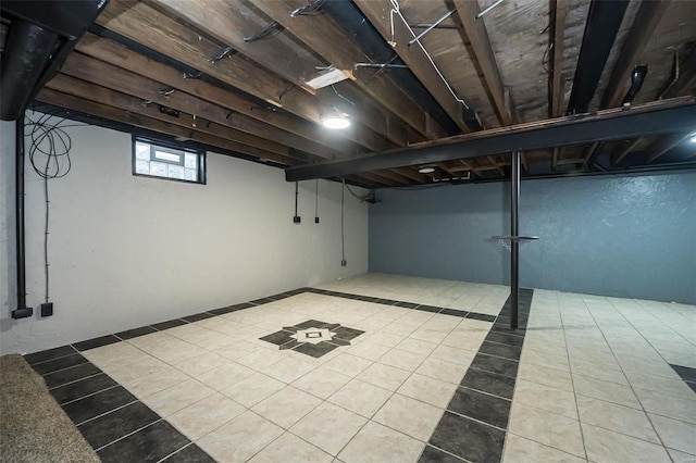 basement with tile patterned flooring