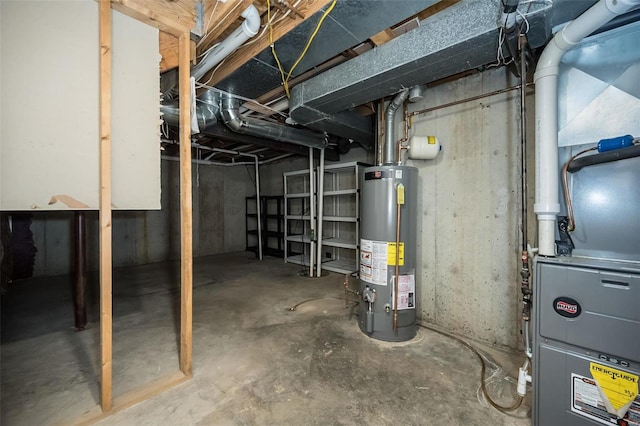 unfinished below grade area featuring water heater